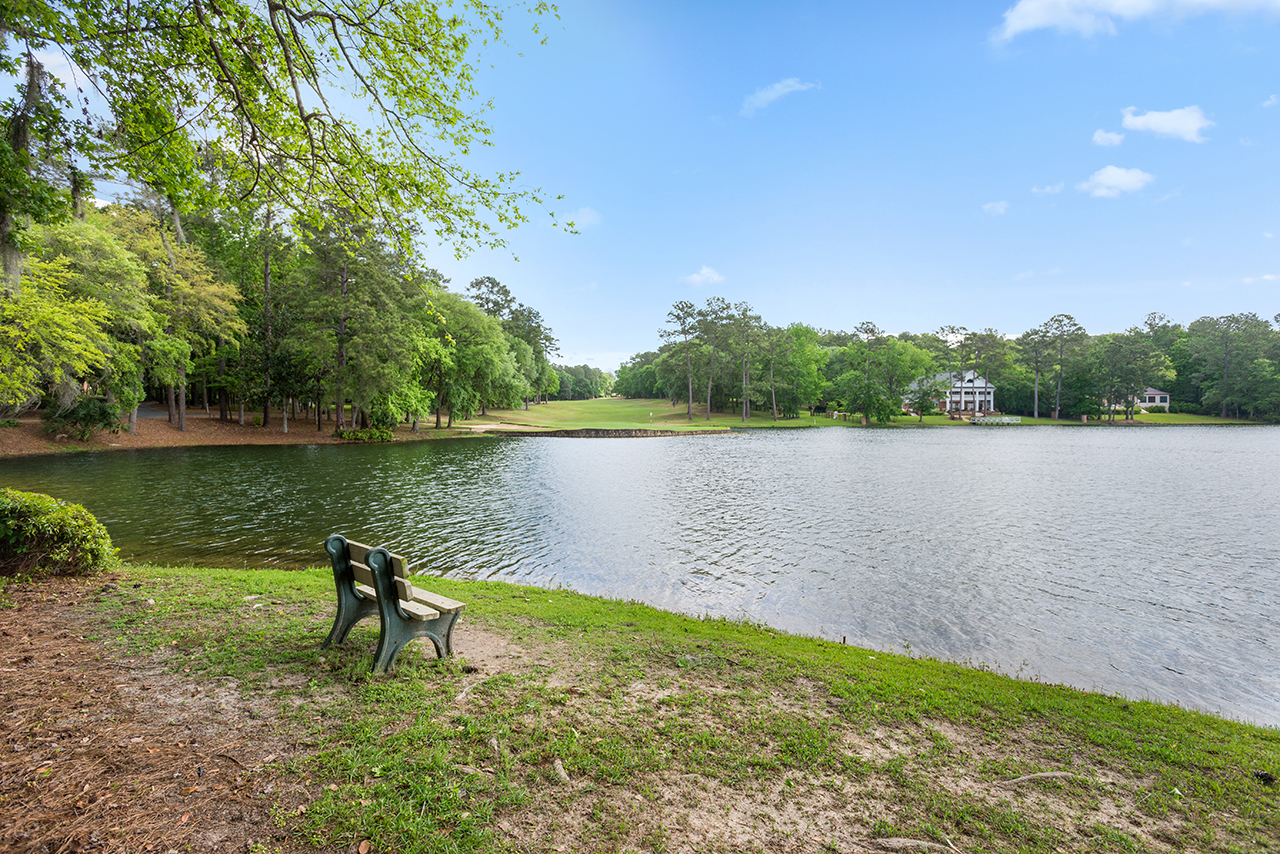 Lake with park bench for viewing in Golden Eagle neighborhood in Tallahassee